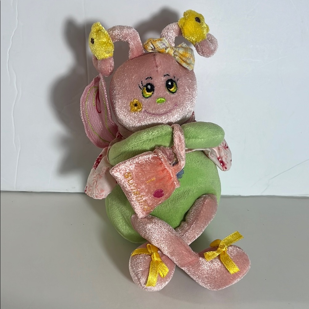 Adorable Plush Insect Toy with Green and Pink Accents